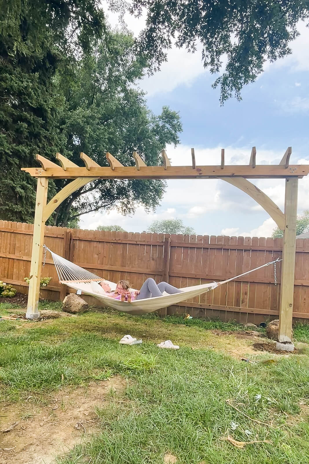 Relaxing on a DIY built, backyard hammock.